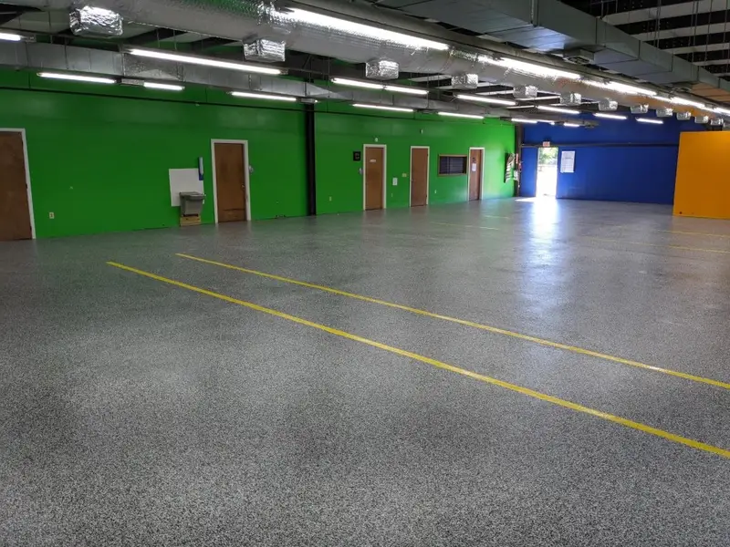 Flake epoxy floor with safety striping in a commercial facility