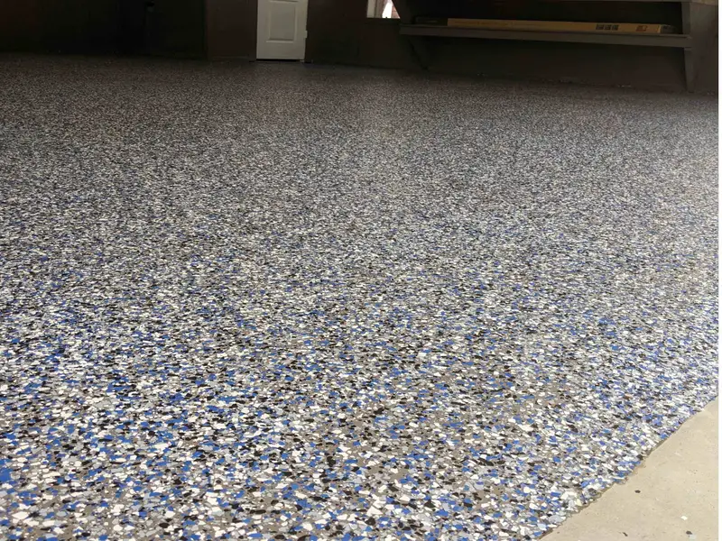 Close-up of blue and gray flake epoxy