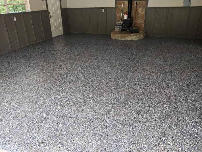 Gray flake epoxy floor in a residential garage