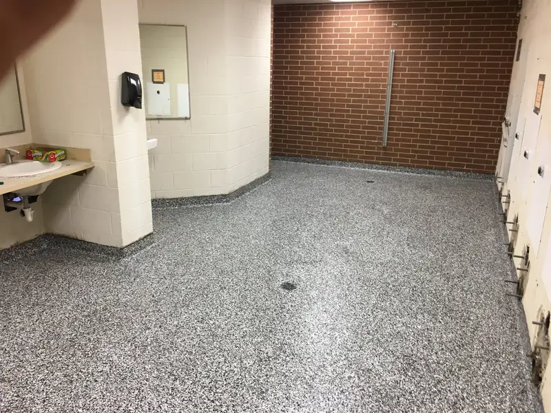 Flake epoxy floor in a commercial restroom