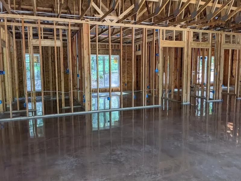Polished concrete slab in new construction before walls go up