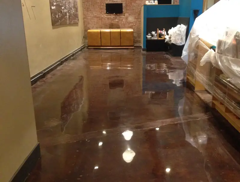 Rich brown polished concrete in a commercial hallway