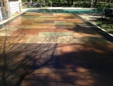 Multi-color stained concrete pool deck