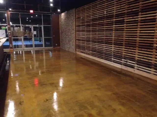 Amber stained concrete in a commercial space