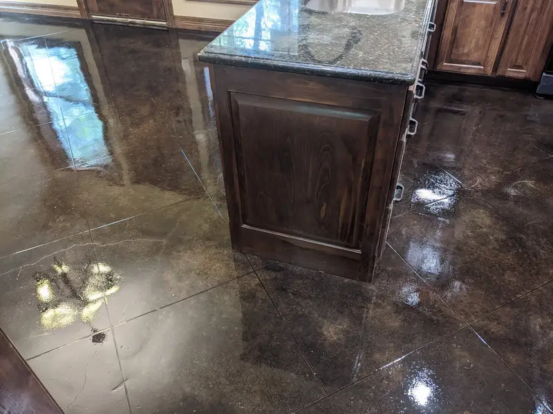 Dark stained concrete kitchen floor