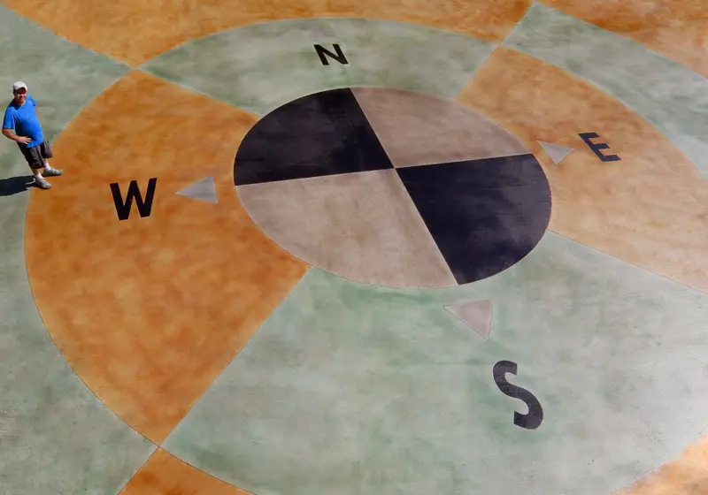 Stained concrete compass rose