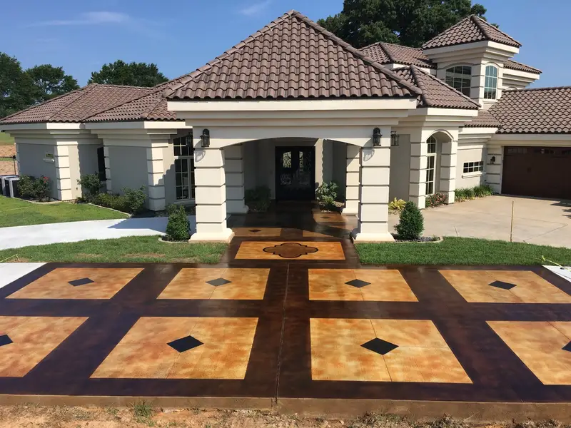 Stained concrete entry in a diamond tile pattern
