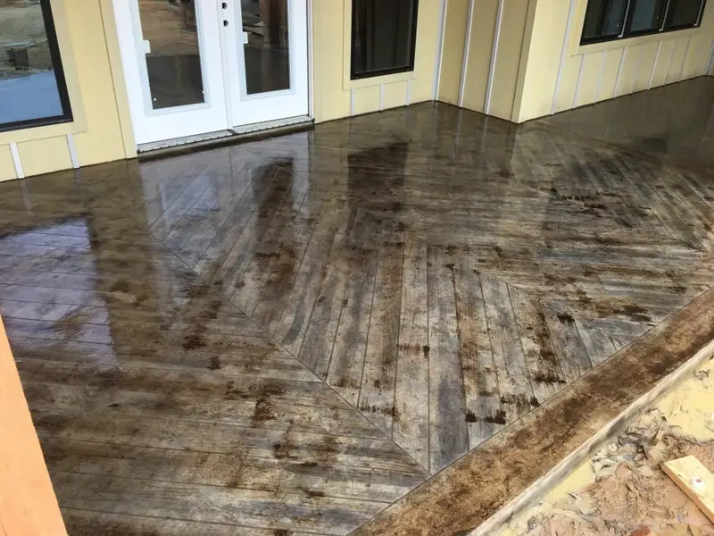 Wood-look concrete with a herringbone border